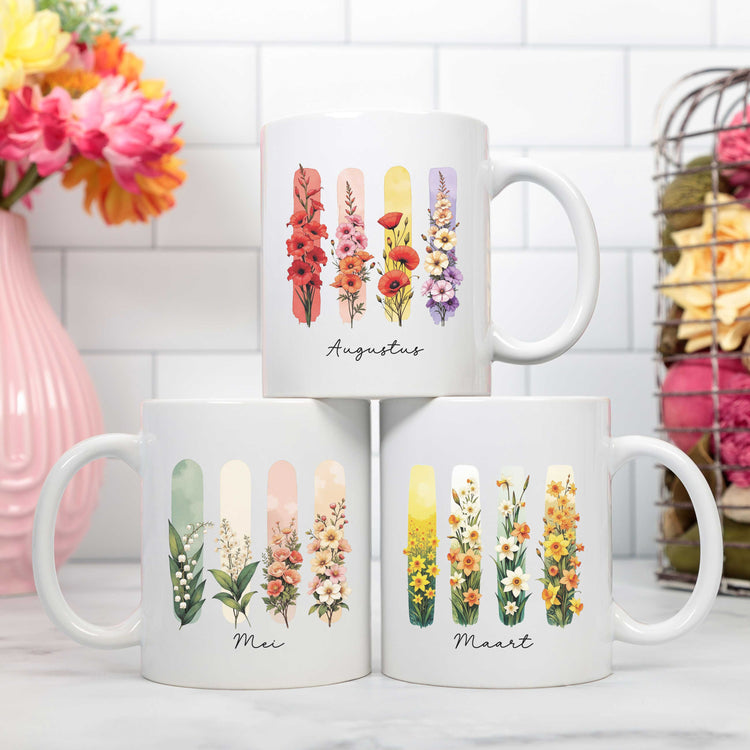 Collectieafbeelding  'Geboortebloem Cadeaus'  'Jouw bloem. Jouw verhaal.' met een lijntekening van een totebag, mok en notitieboek met bloemenillustraties op een zachte roze achtergrond.