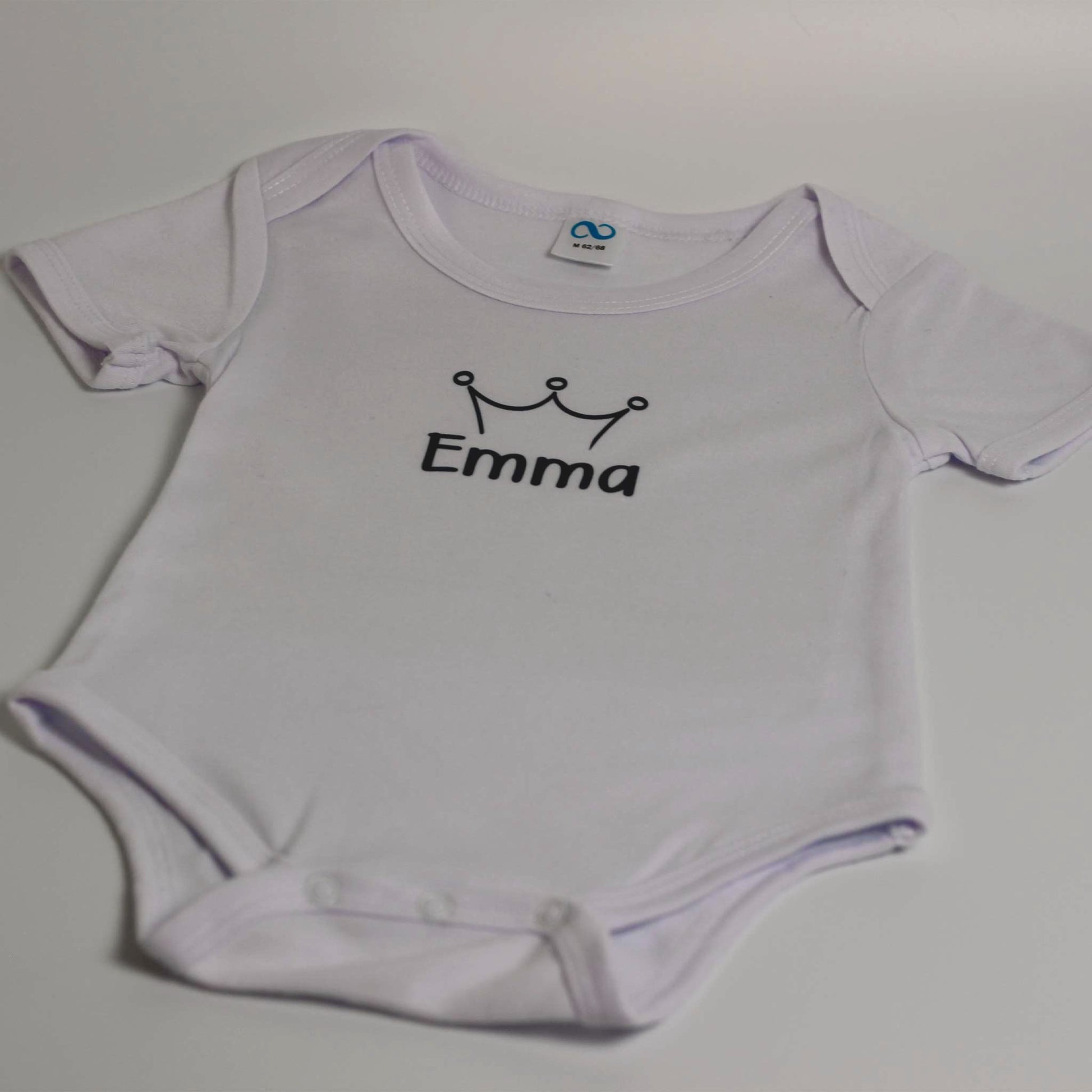 Wit baby rompertje met naam en kroontje