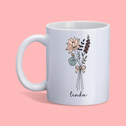 Keramische mok met bloemenillustratie en naam Linda, witte mok op roze achtergrond