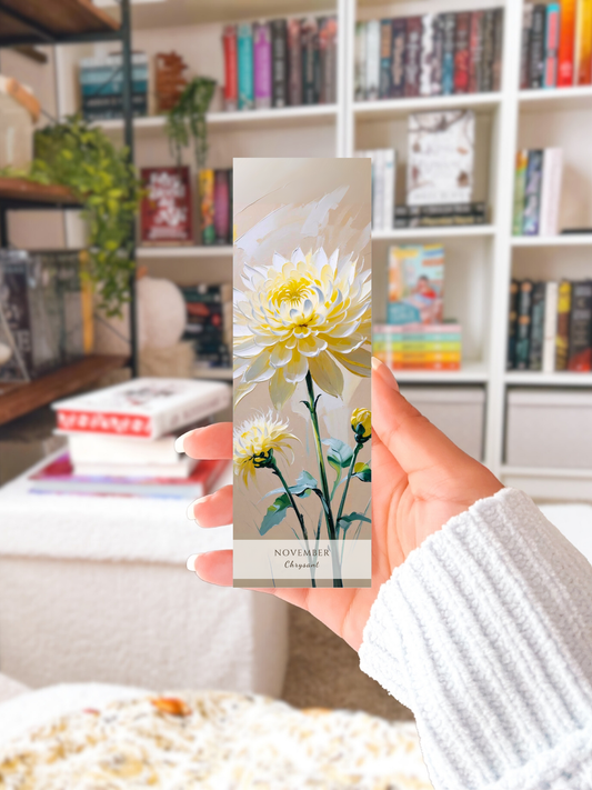 vrouw met bookmark in haar hand, geboorte bloem boekenlegger voor de maand november , met  kunstzinnige illustratie van Chrysanten