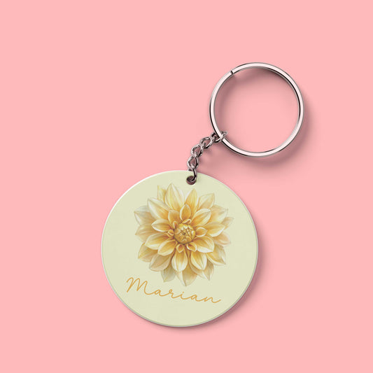 Ronde sleutelhanger met dahlia illustratie en naam Marian – bloemenaccessoire