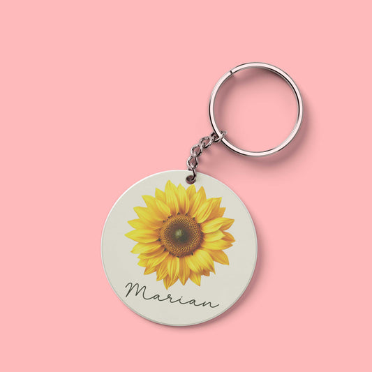 Ronde sleutelhanger met zonnebloem illustratie en naam Marian – persoonlijk cadeautje