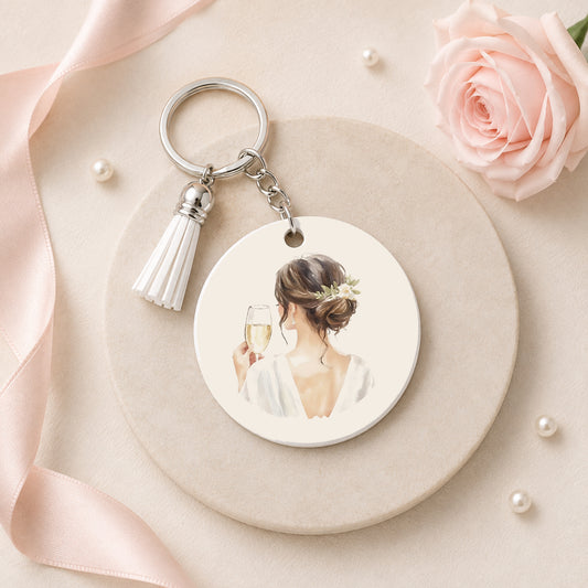 Bruid sleutelhanger met champagneglas, wit kwastje en zilverkleurige ring