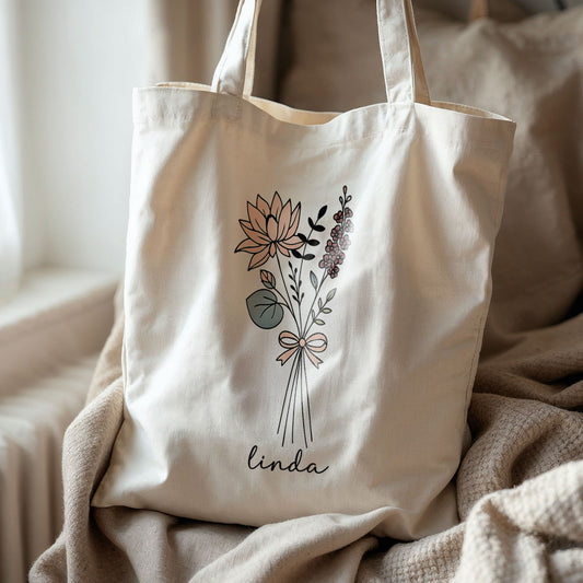 Linnen tas met bloemen lijnillustratie en naam Linda op stoel in zachte setting